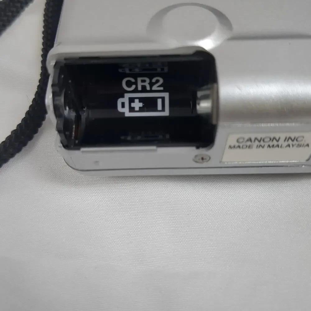 Canon IX240 Camera Elph Jr. Film Point & Shoot 26mm‎ 1:2.8 Silver Used